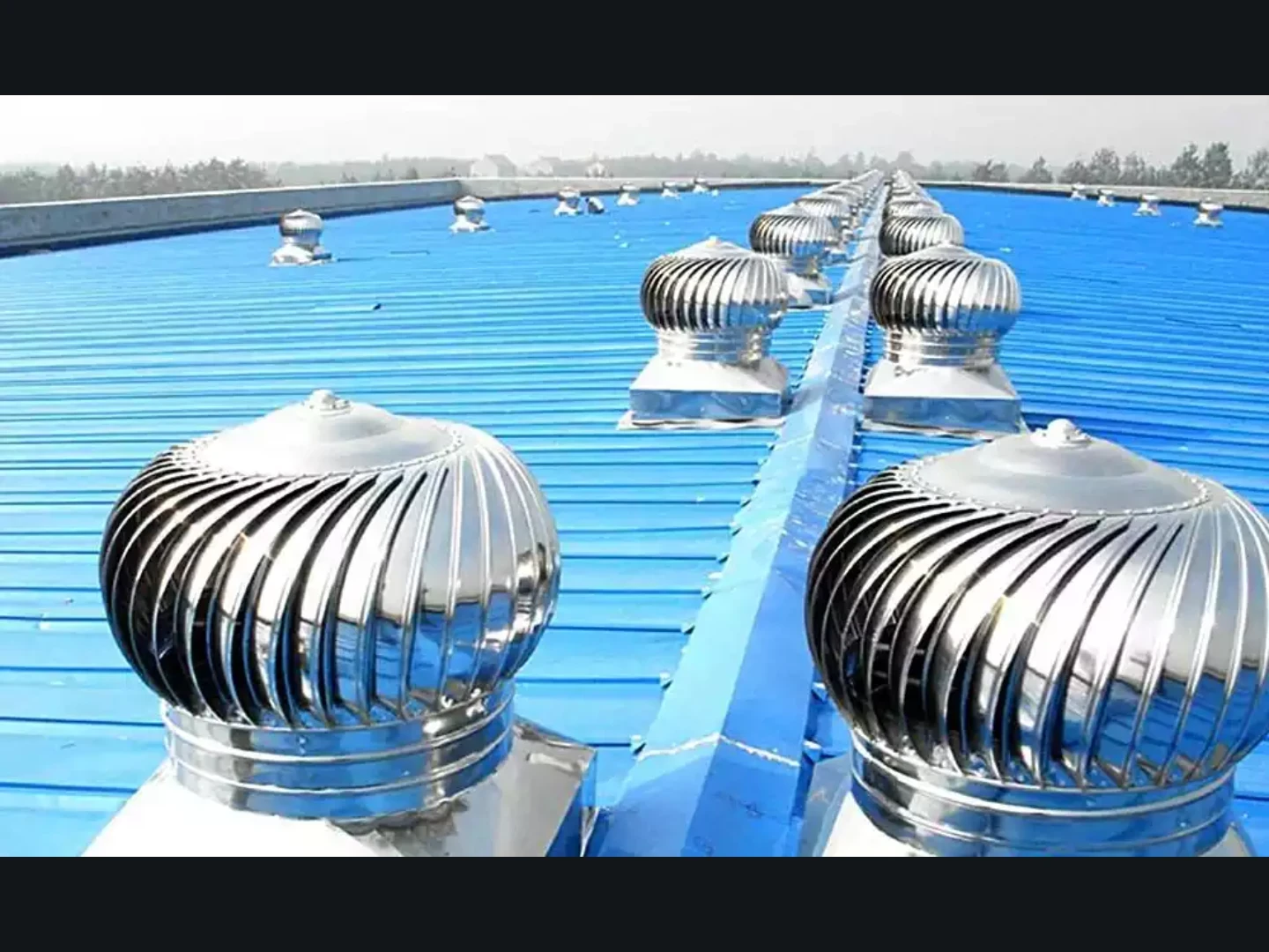 Industrial metal roof fitted with turbo ventilators