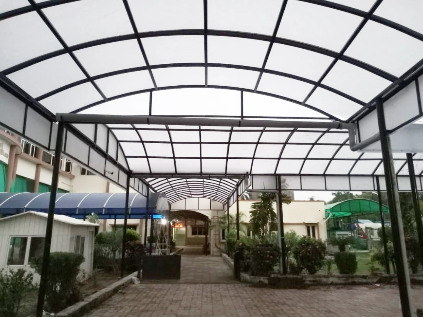 Commercial building with clean metal roofing and canopy